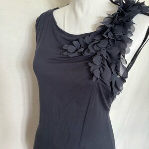 Dark gray tank top tee with soft flowers on the left shoulder